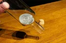 REAL COIN IN BOTTLE (HALF) by Bacon Magic – Image 2