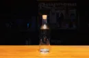 REAL COIN IN BOTTLE (HALF) by Bacon Magic – Image 3