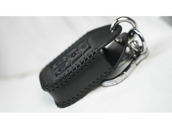 Palm Peeker Keychain Case by PITATA MAGIC