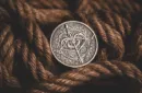 BOW AND ARROW COIN SILVER ( Gimmick and Online Instructions)  by Bacon Magic – Image 1